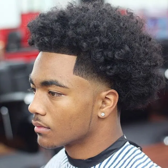 low taper fade curly hair black male