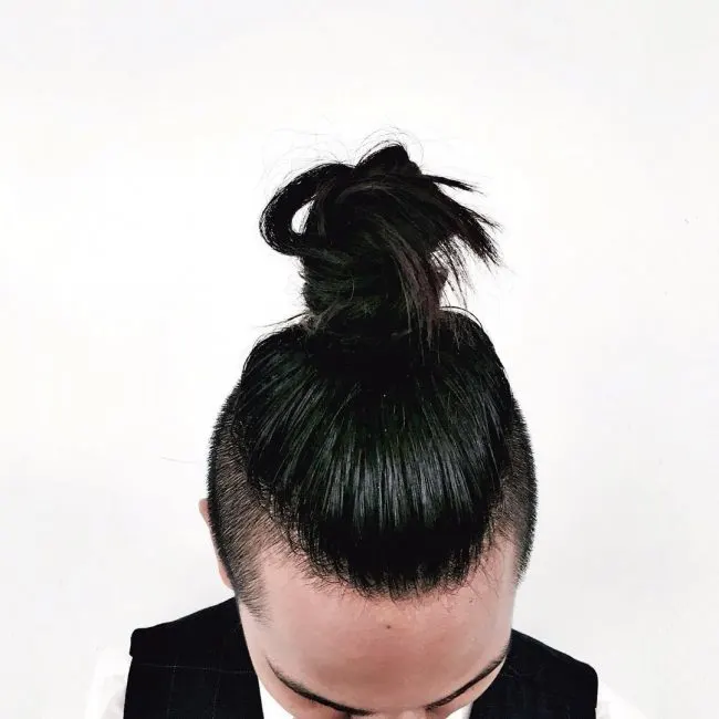 Coal Black Hair with High Top Knot