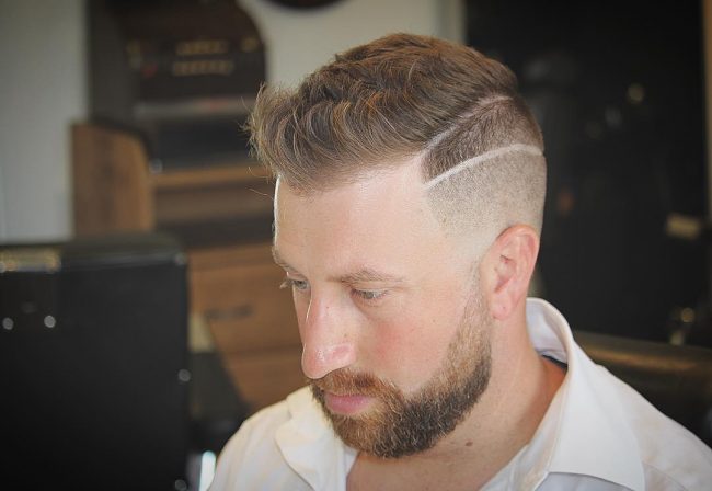 haircut with 3 lines on side