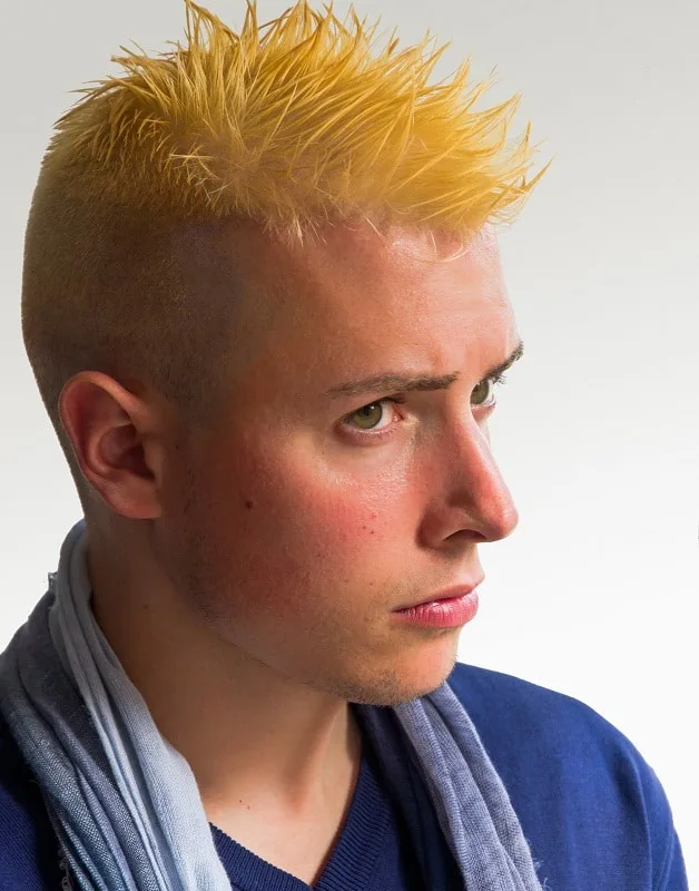 young man with a short red dyed mohawk, red eyes and a | Stable Diffusion