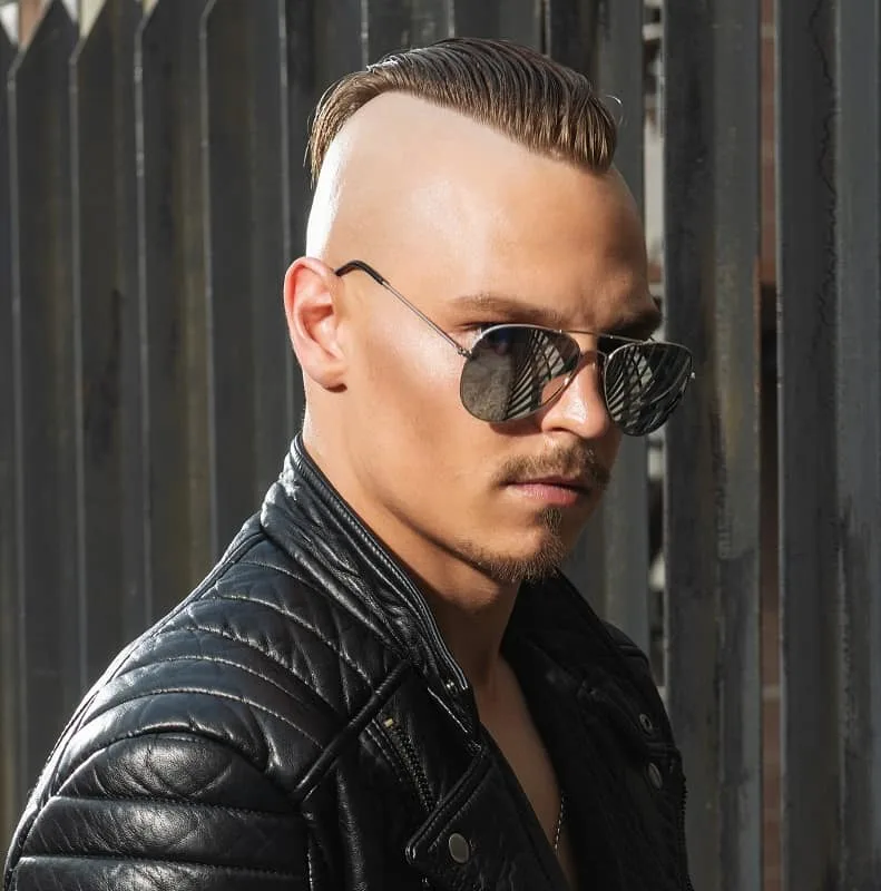 Portrait Of A Brutal Man With Punk Hairstyle On A Dark Background Free  Image and Photograph 199878169.