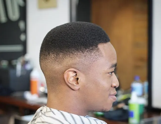 Natural Afro Texture and Sharp Fade