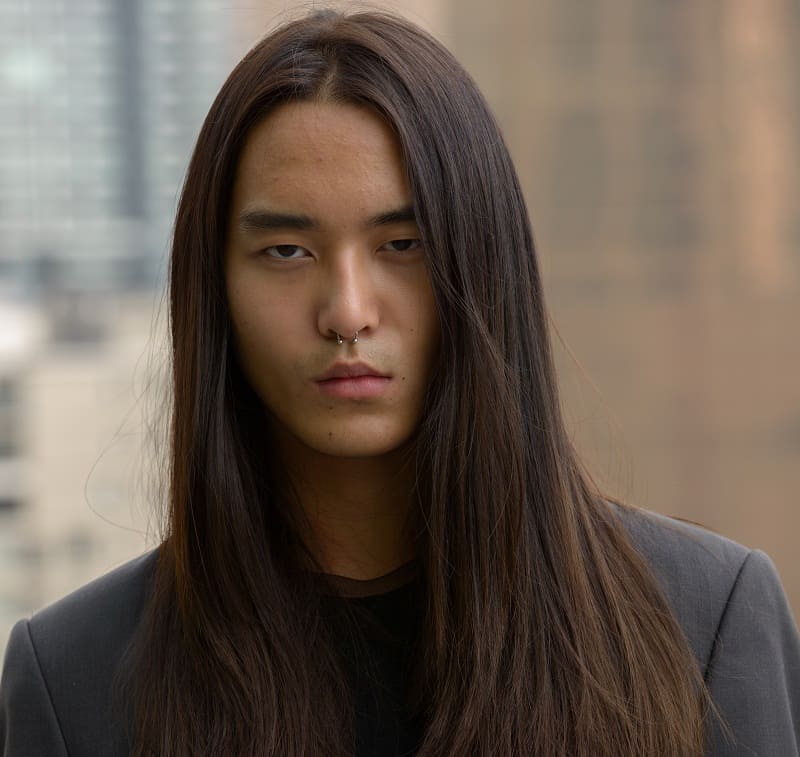 Asian man with long hair