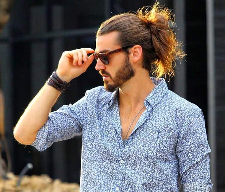 man with ponytail updo