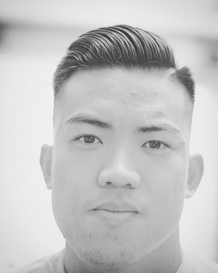 marine haircut with hard part