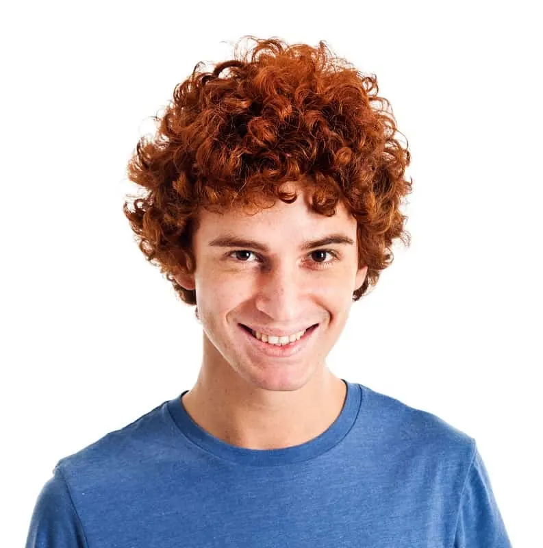 guy with short copper curls