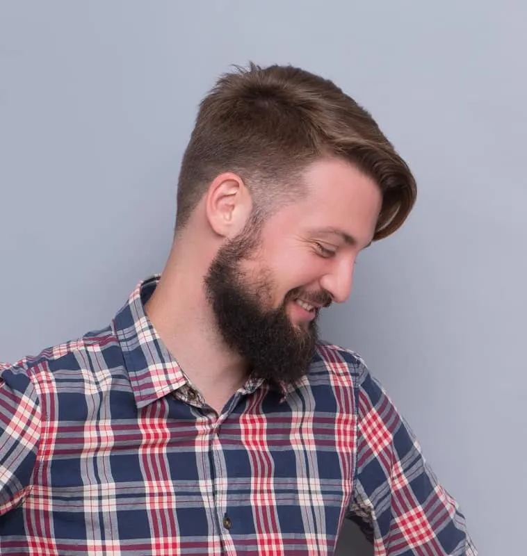sideswept hairstyle with beard